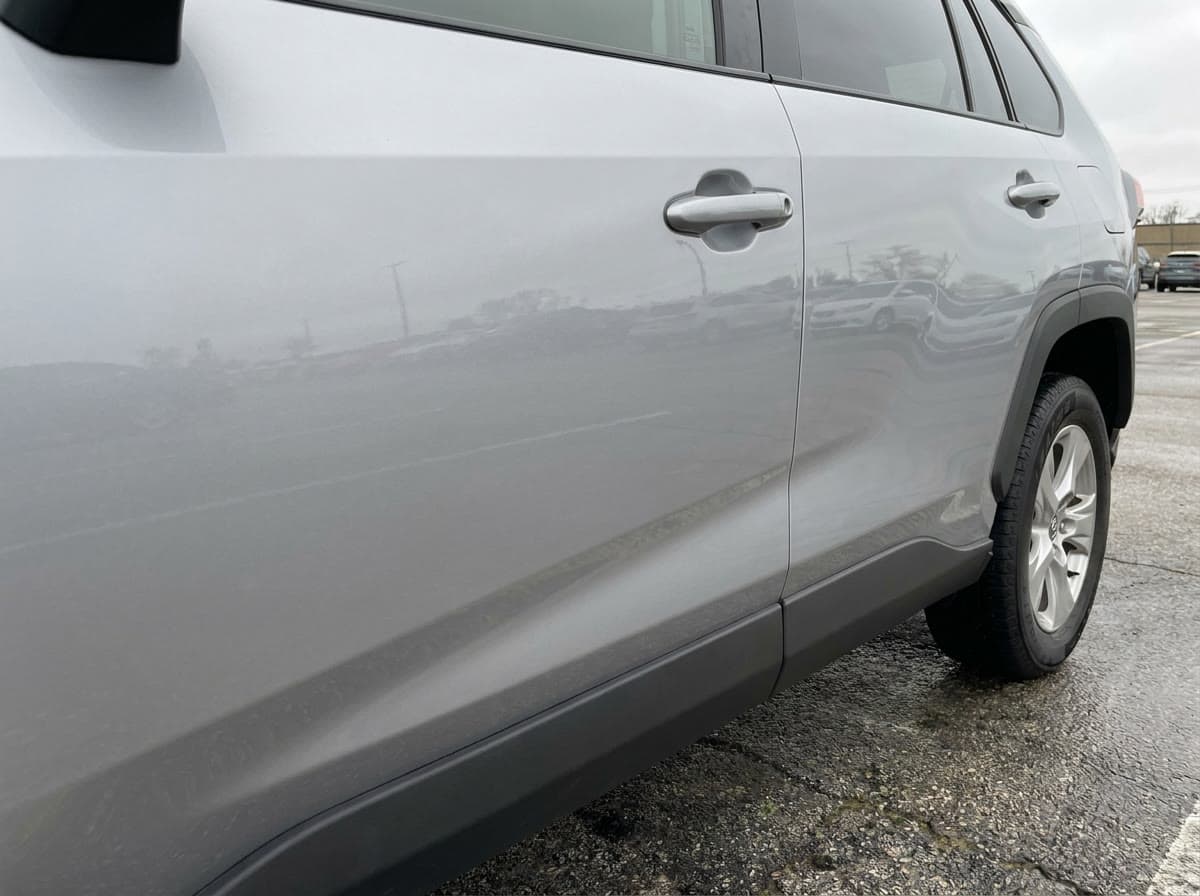 Front driver's door at pickup, overcast, undamaged